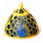 pottery dish with peacock design