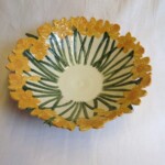 plate with yellow flower design