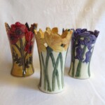 three flowery pots